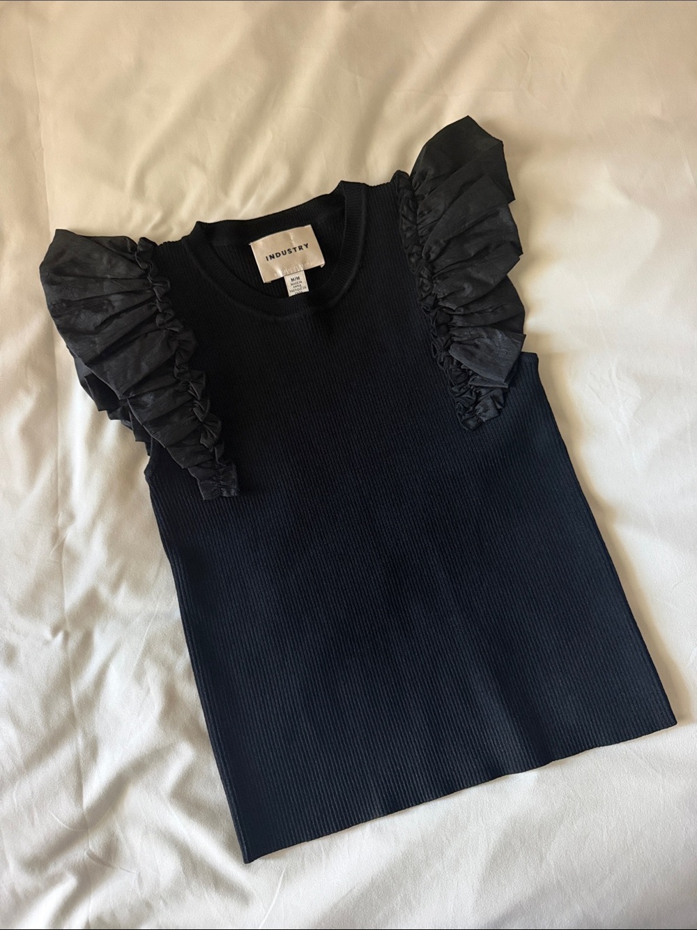 Industry ruffle top
